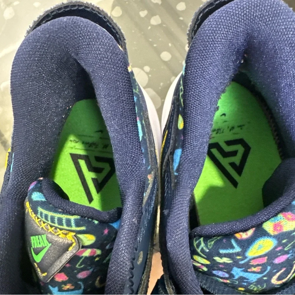 Nike Kids Navy Sneakers with Pink and Yellow Accents